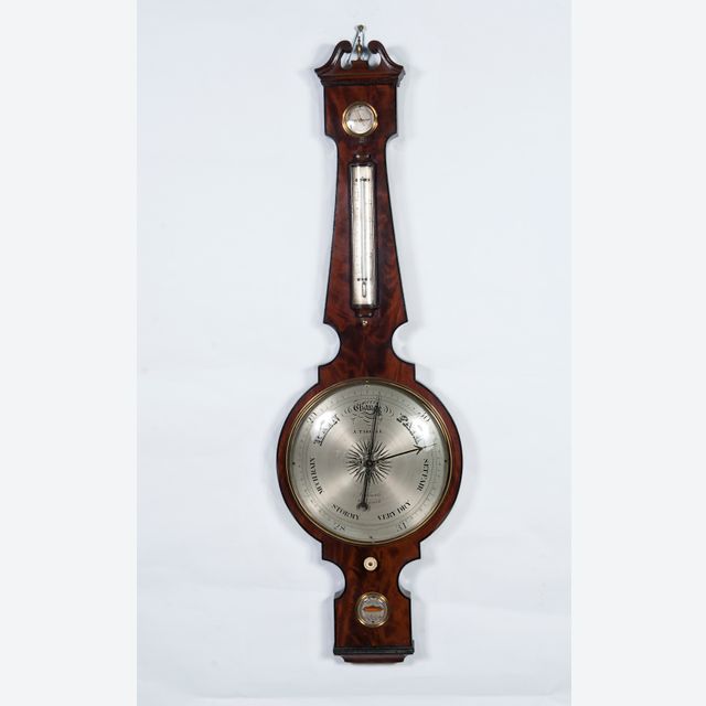 An imposing king size wheel barometer by