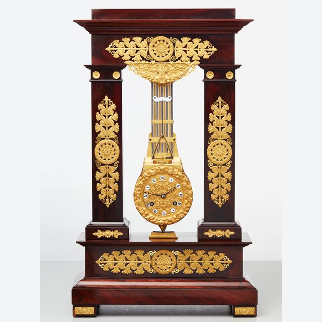 A rare French mahogany and bronze oscillating mantel clock, circa 1830