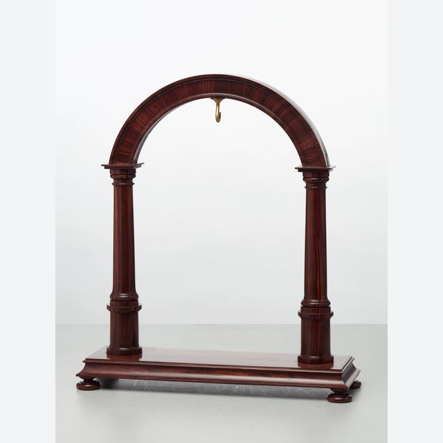 An elegant walnut contemporary custom made stand for displaying a watch