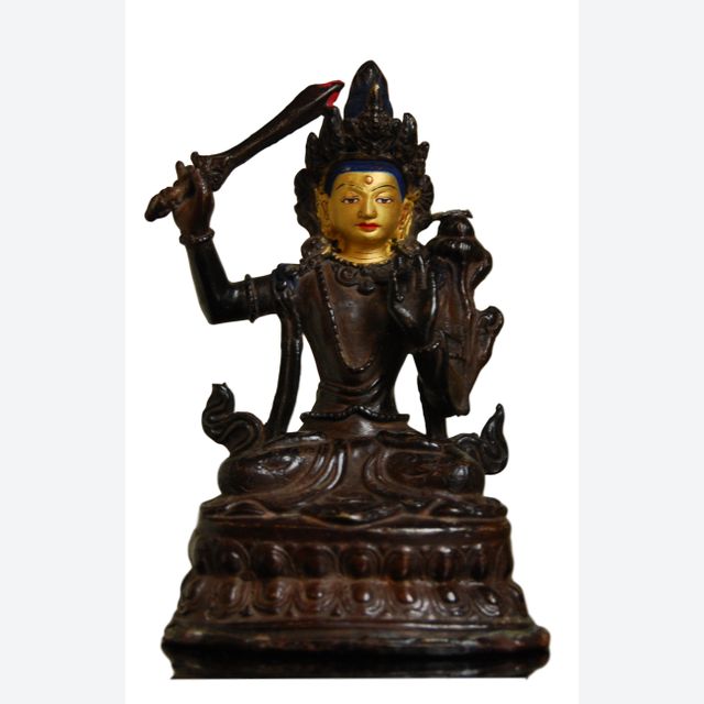 Oda 36 Chino-Tibetan gilt bronze figure of a deity