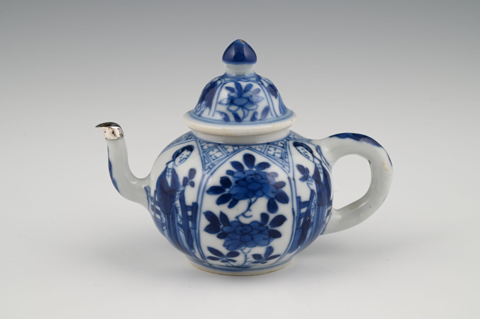 A miniature Chinese porcelain teapot.