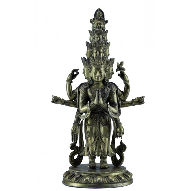 A GILT-BRONZE FIGURE OF AN ELEVEN-HEADED AVALOKITESVARA