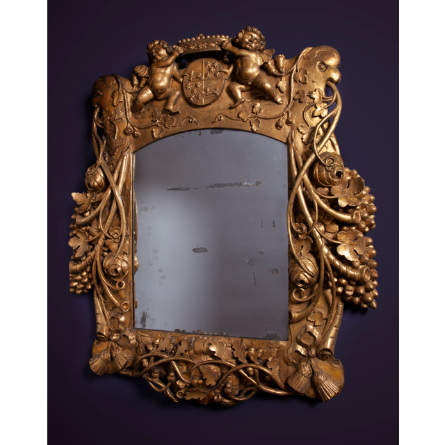 A Louis Quartorze mirror with coat of arms of VOC governor Cornelis Kien