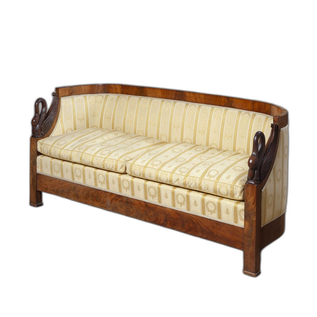 A mahogany Empire sofa with carved swans