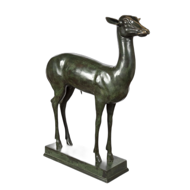 An elegant bronze sculpture of a fawn
