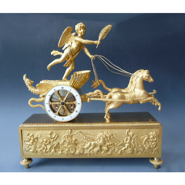“Cupid’s Chariot”, a French Empire gilt bronze figural mantel clock, Le Roy,  Palais Royal à  Paris, c. 1810.