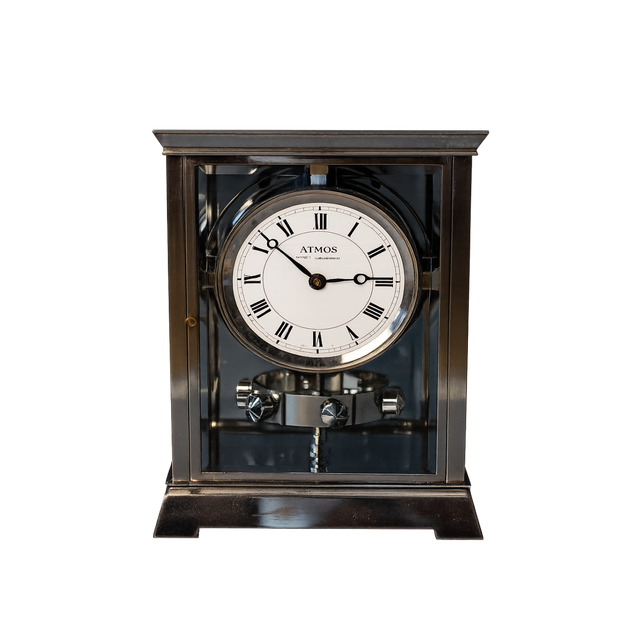 Reutter Atmos, white enamel dial, c. 1930. Movement numbered: 1090.