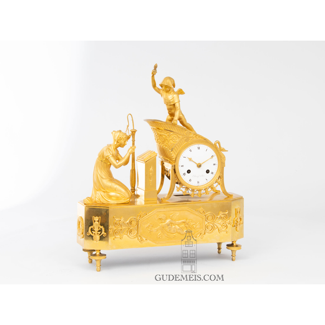 A French Empire ormolu mantel clock 'Ars Amatoria', circa 1800