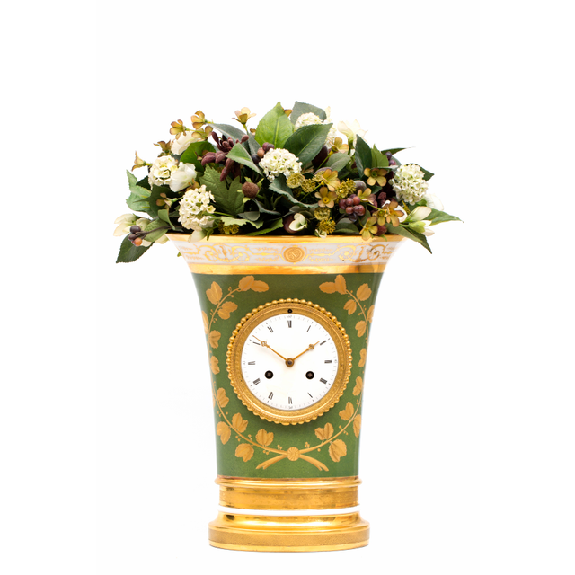 A lovely French Empire porcelain urn mantel clock, circa 1800