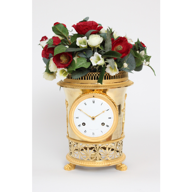 A fine French Empire ormolu urn mantel clock, Angevin A Paris, circa 1800