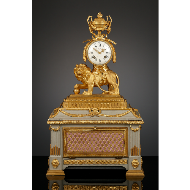 French Louis XVI lion mantel clock with musical box