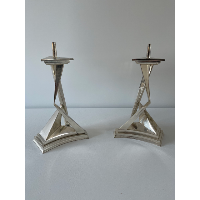 Salvadore Dali, a set CHROMIUM PLATED METAL PRICKET CANDLESTICKS: L'IMMORTALITI DE CASTOR ET POLLUX