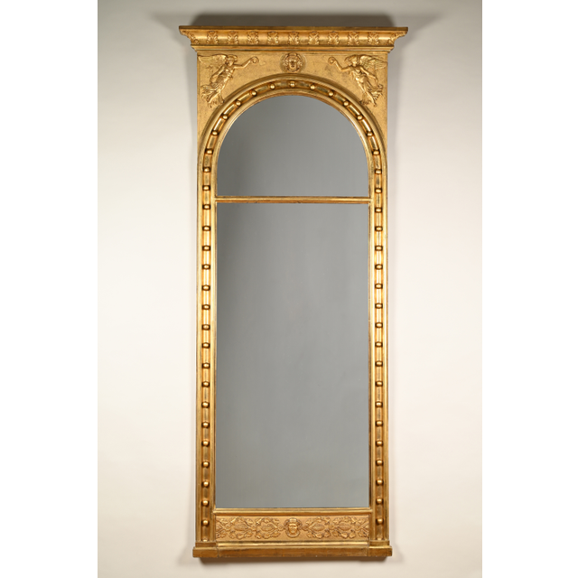 A  large Empire mirror.