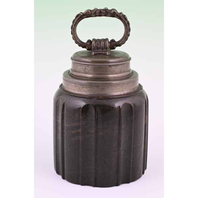Sharpstone storage canister.
