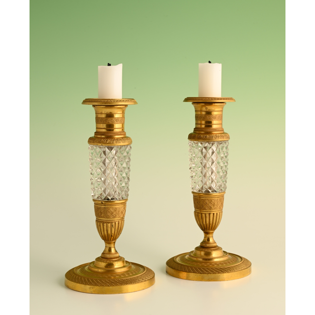 A pair of  ormolu bronze Empire candle sticks
