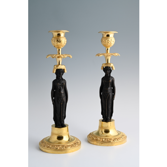 A pair of  ormolu bronze Empire candlesticks