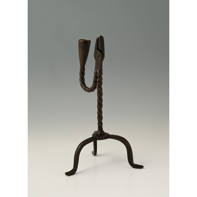 A rare bronze candle holder