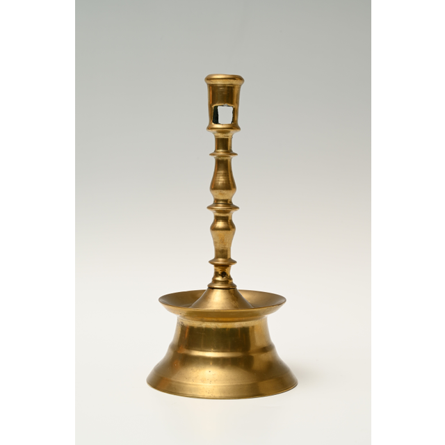 A Dutch bronze candlestick
