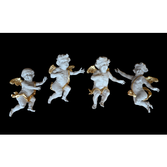 Four polychrome wooden angels