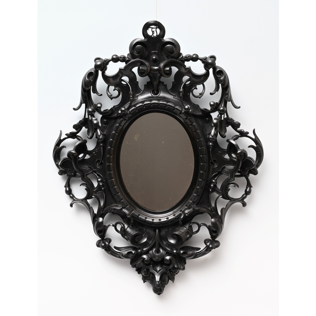 A decorative mirror.