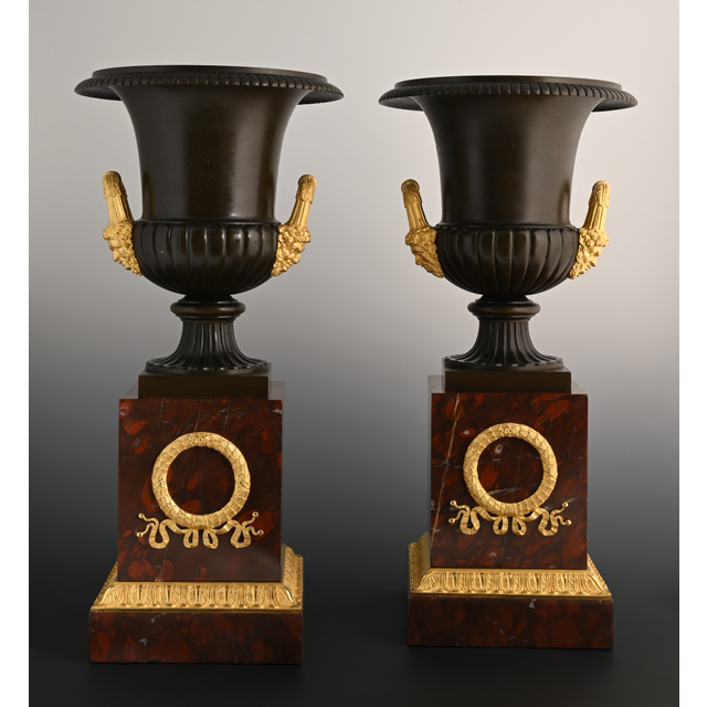 A pair of large ormolu and patineted bronze Empire vases