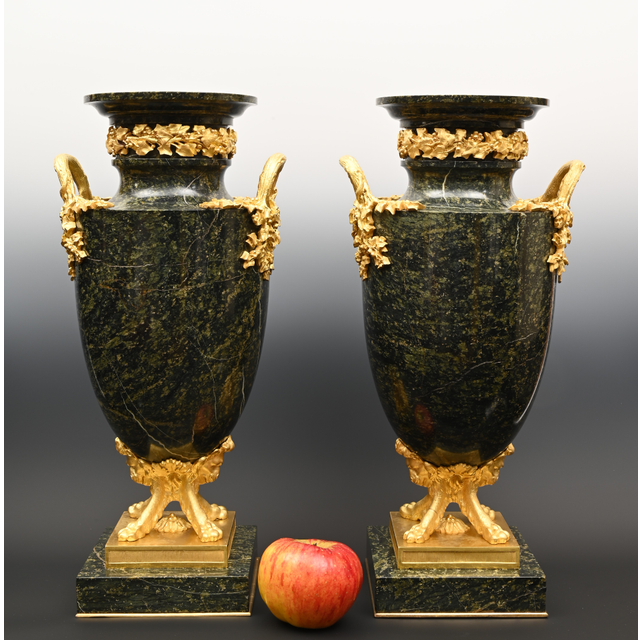 A pair of large marble decorative vases