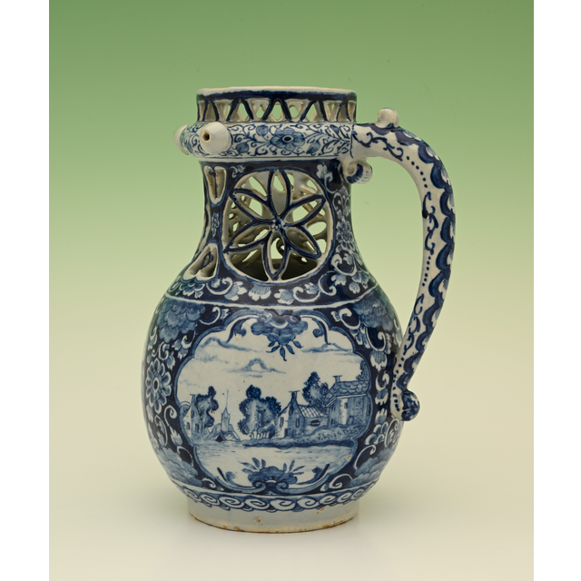 A delftware puzzle jug