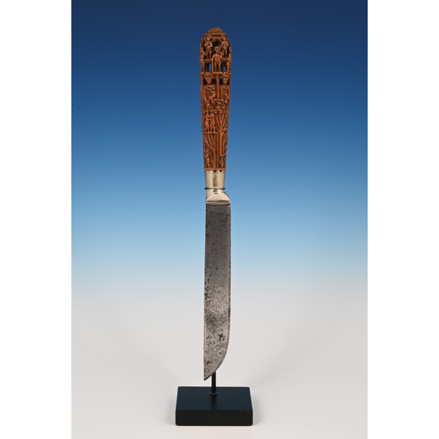 An extremely finely carved palm wood knife