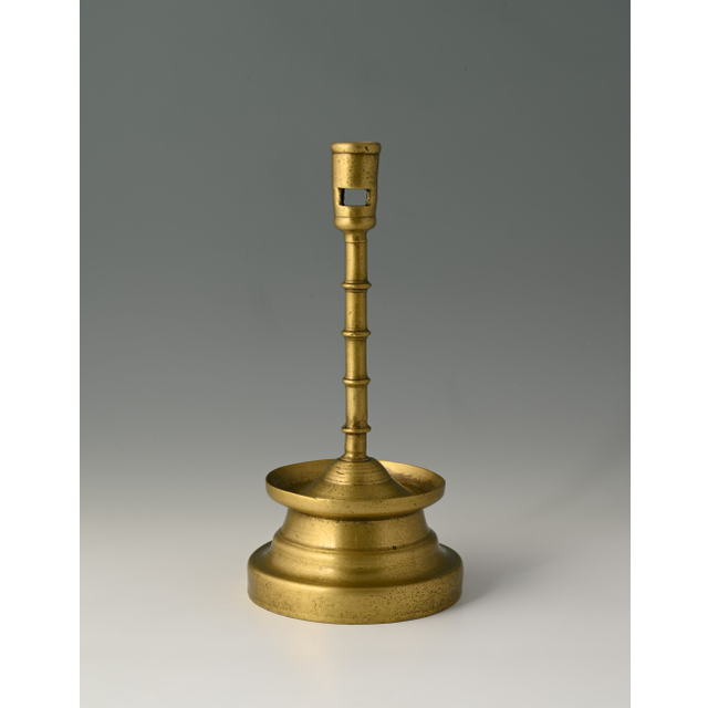 A Dutch bronze candlestick