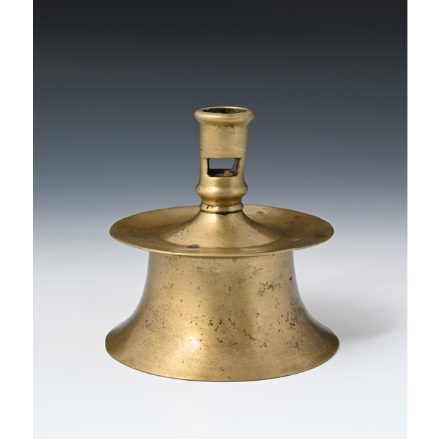 A bronze candlestick