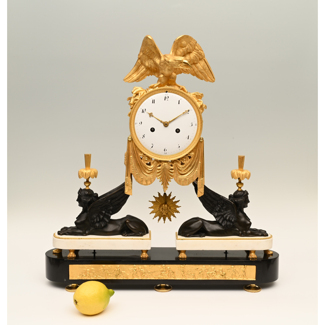 An exceptional Louis Seize mantel clock.