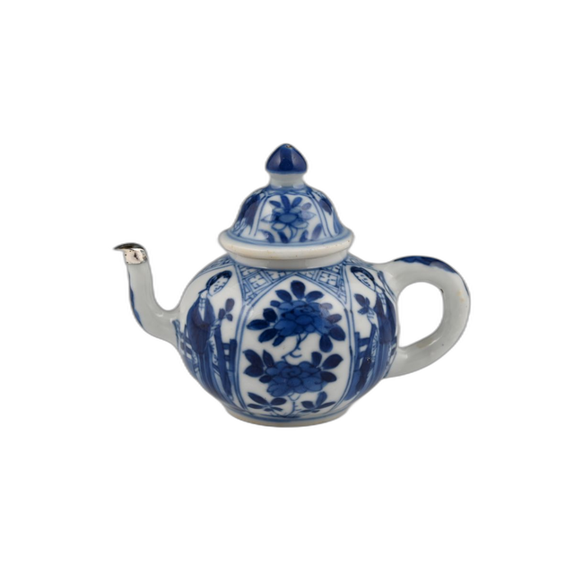 A miniature Chinese porcelain teapot.