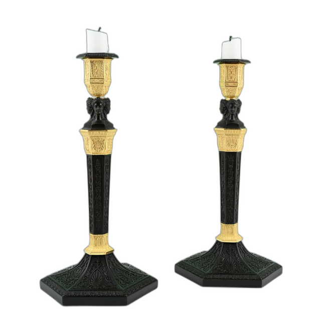 A pair of  ormolu bronze and patineted Empire candle sticks
