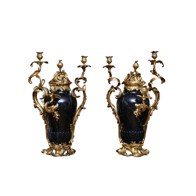 An impressive pair of candelabra, signed ‘Escalier de Cristal Paris’