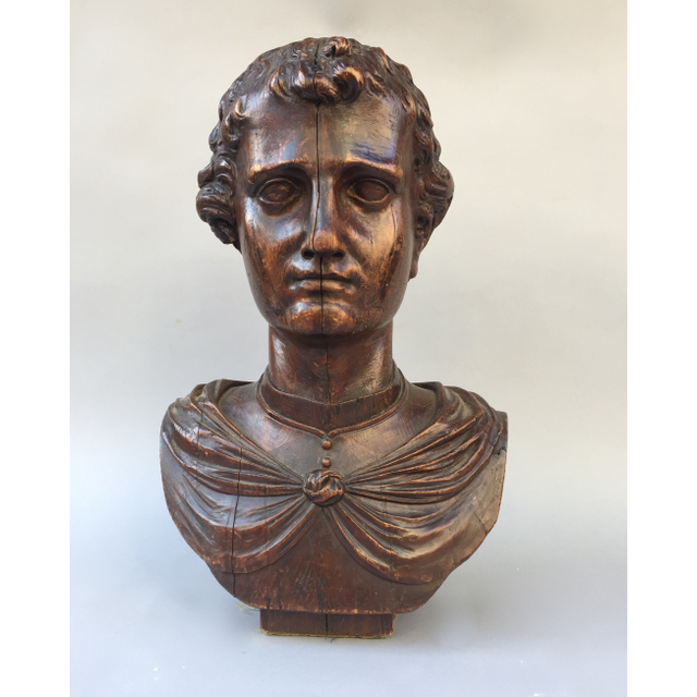 Wooden bust of a young man