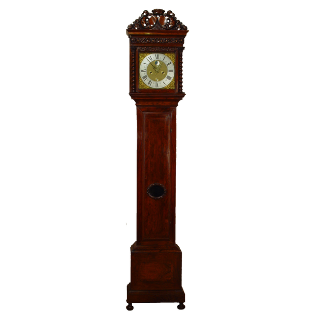 An early Dutch walnut veneered and carved longcase clock, by Huijgens, circa 1690