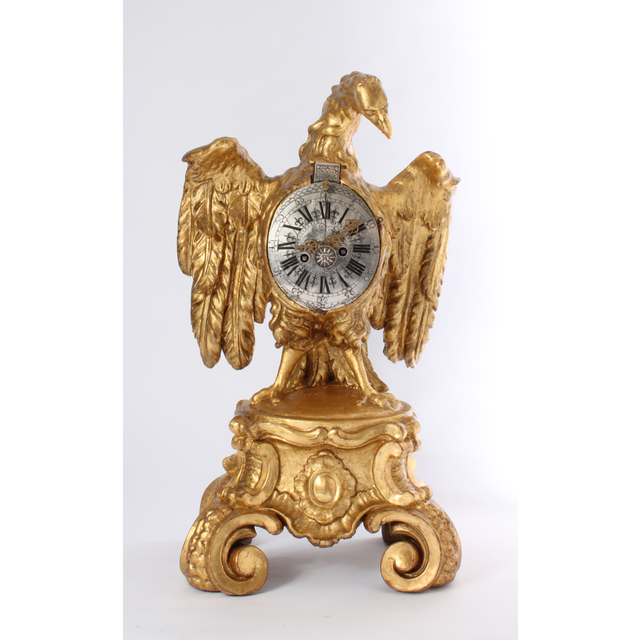 A decorative South German parcel gilt sculptural table clock, circa 1730.
