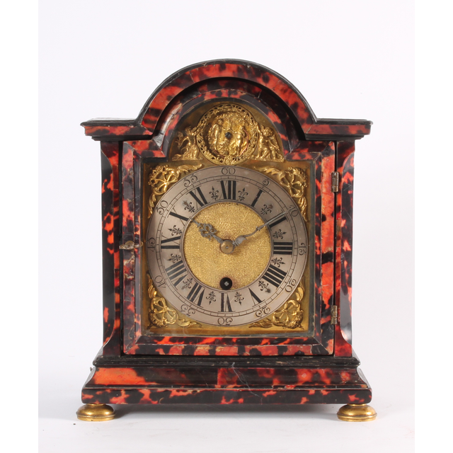 An attractive small South German red tortoishell bracket timepiece with automaton, circa 1740.