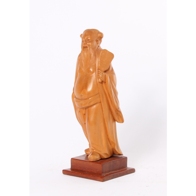 A lovely Chinese carved boxwood sculpture of a man, circa 1920.