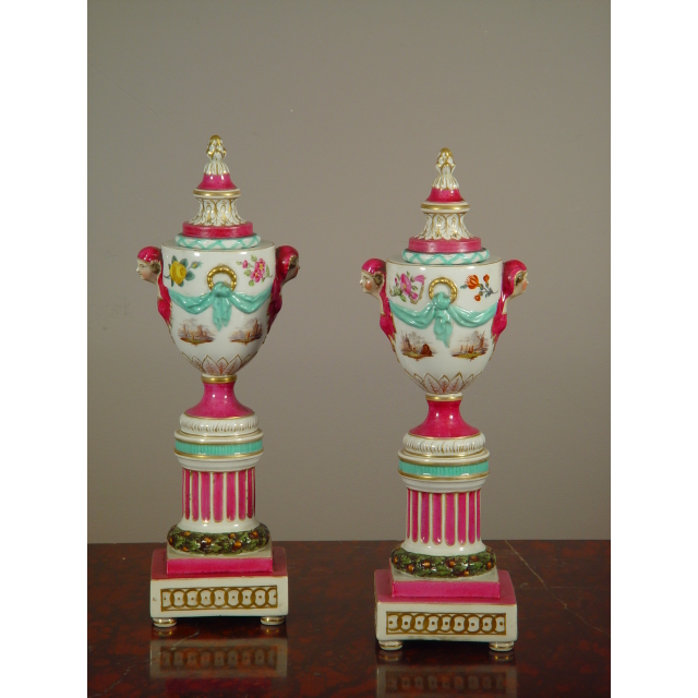 A pair of polychrome porcelain urns 'à double usage', mid 19th Century.