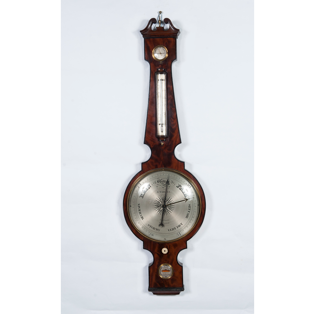 An imposing king size wheel barometer by