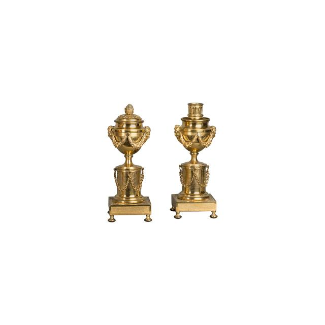 A pair of French Louis XVI ‘a double usage’ candlesticks, with rose mercury gilding