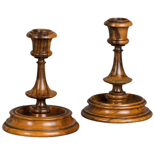 A lovely pair of small Olive wood candlesticks probably early XX century