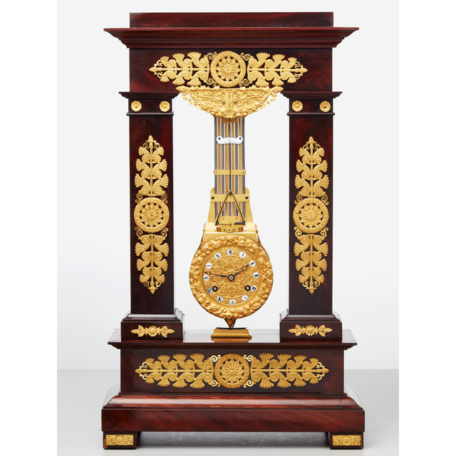 A rare French mahogany and bronze oscillating mantel clock, circa 1830
