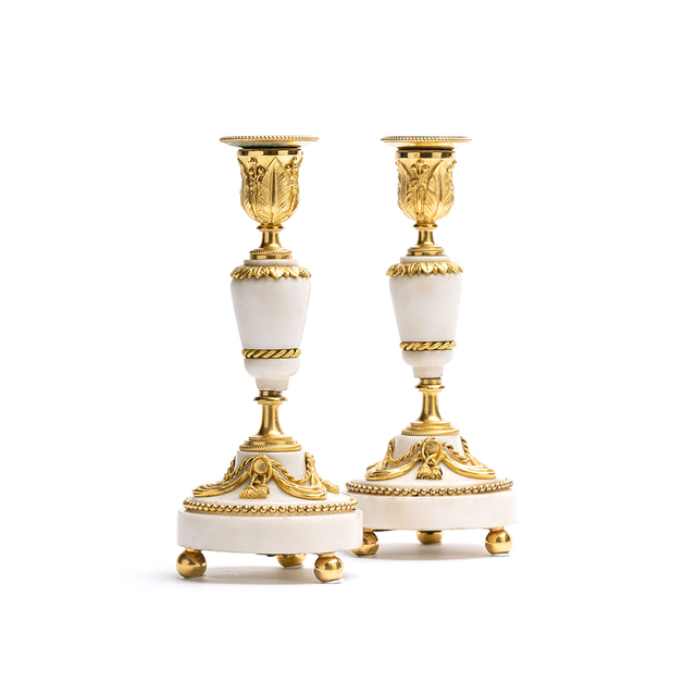 A pair of high-quality white marble candlesticks from the Louis XVI period