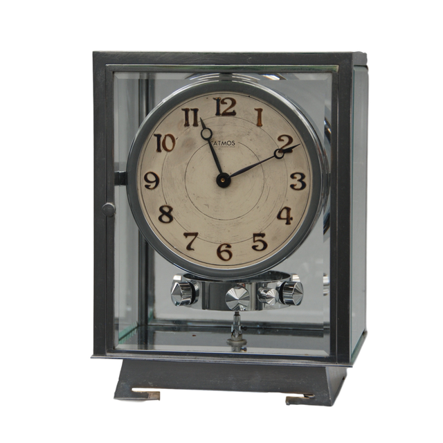 M127 Nickel five glasses ATMOS Clock champagne coloured  dial, Arabic numerals. On the back numbered 6972 and signature Brevet J.L. Reutter, S.G.D.G., made in Paris.