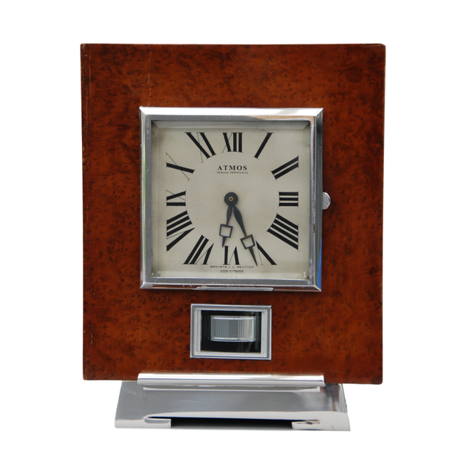 M149 Atmos clock, Amboina wood, J.L. Reutter, France circa 1930.