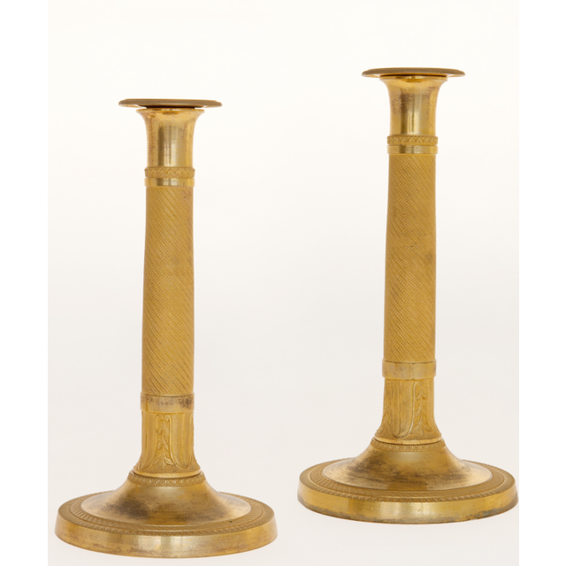 A Pair of Empire Candlesticks in Guilded Bronze