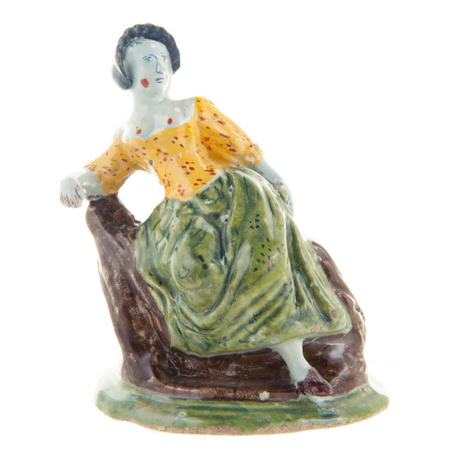 Polychrome Dutch Delft Figurine of Seated Lady