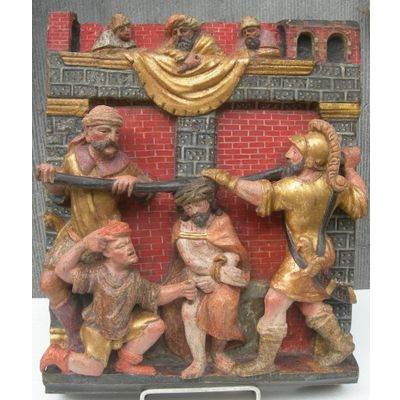 A POLYCHROME CARVED WOODEN RELIEF  1 of 2
